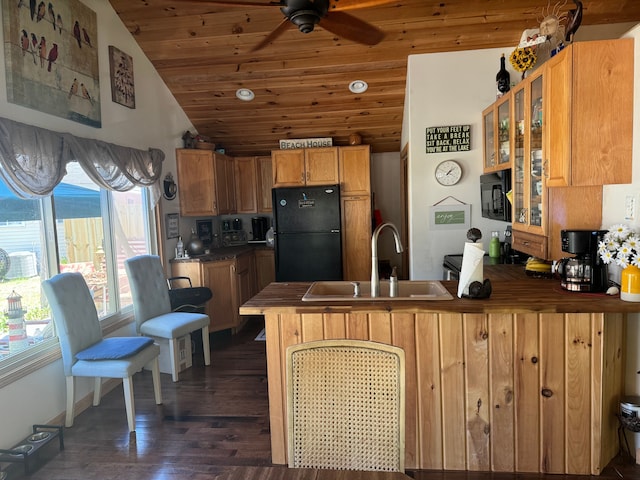 kitchen featuring glass insert cabinets, a peninsula, wooden ceiling, black appliances, and a sink