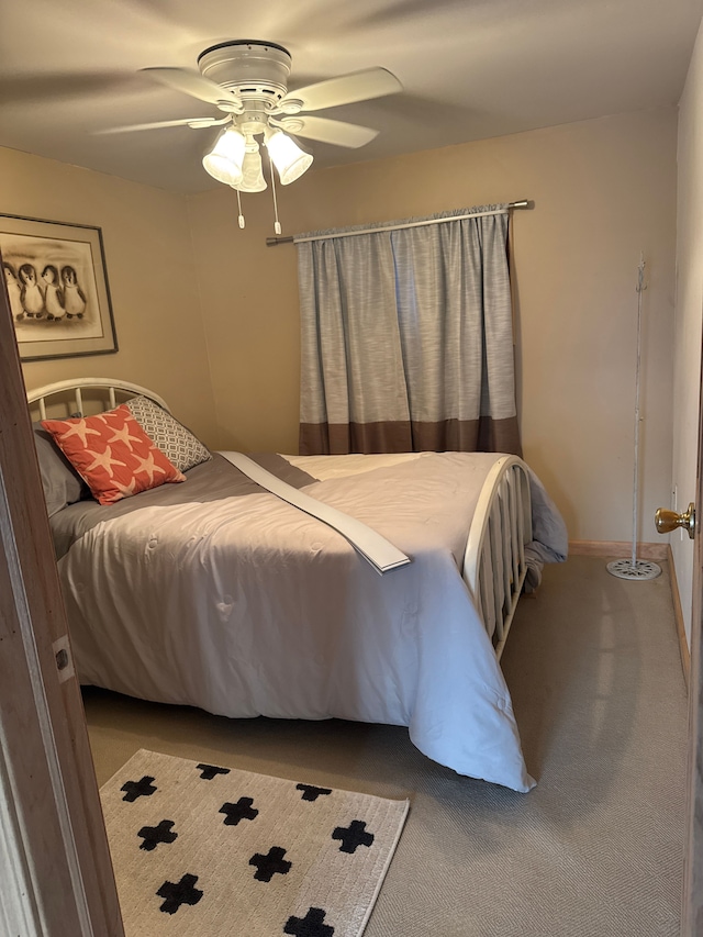 bedroom featuring carpet flooring and ceiling fan