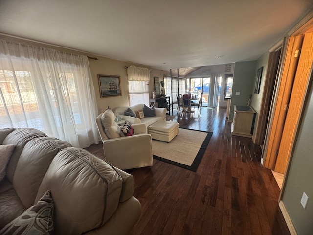 living area featuring dark wood-style floors