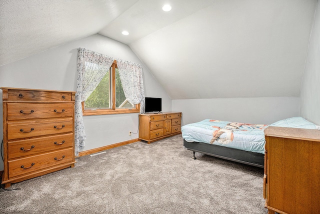 carpeted bedroom featuring lofted ceiling, recessed lighting, and baseboards