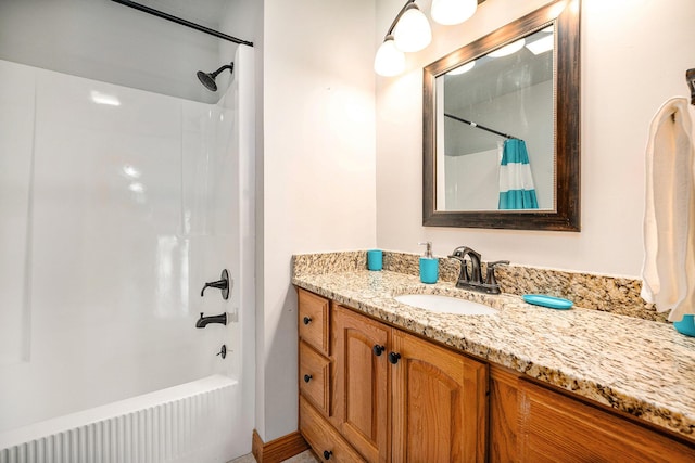 full bathroom with shower / bath combo with shower curtain and vanity