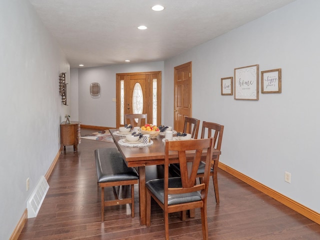 dining room with recessed lighting, visible vents, baseboards, and wood finished floors