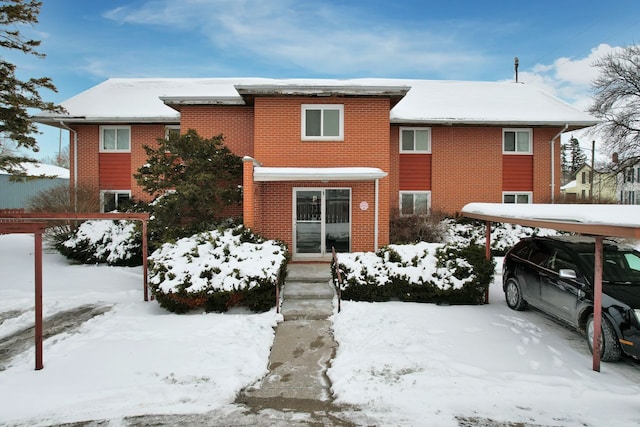 view of front of home with brick siding