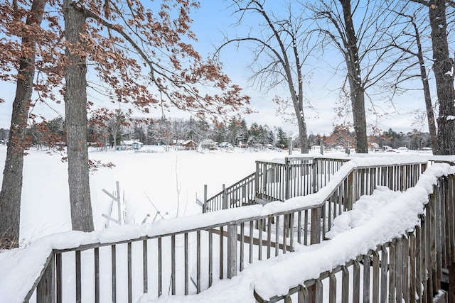 view of snow covered deck