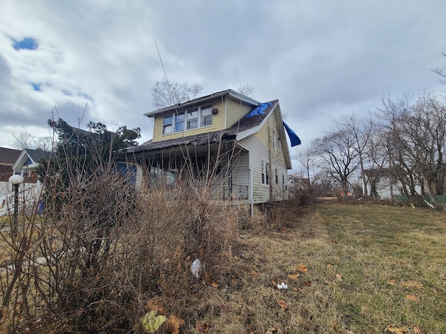 exterior space with a front lawn