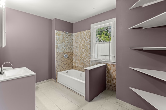 bathroom with a washtub, tile patterned flooring, a shower, and vanity