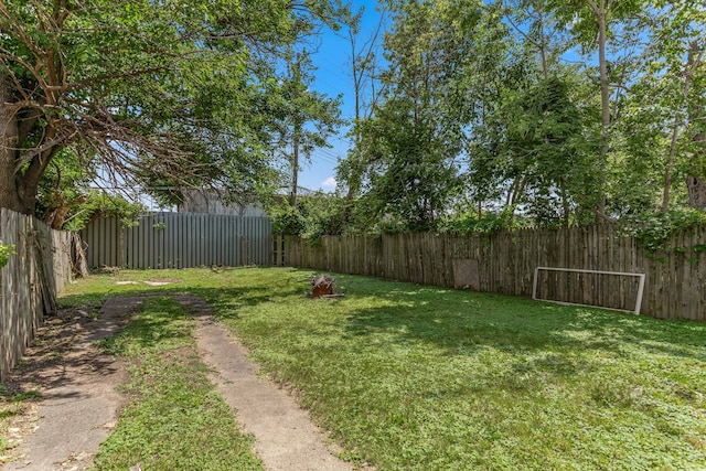 view of yard featuring a fenced backyard