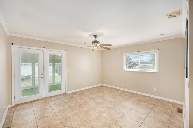 unfurnished room featuring baseboards, visible vents, crown molding, and french doors