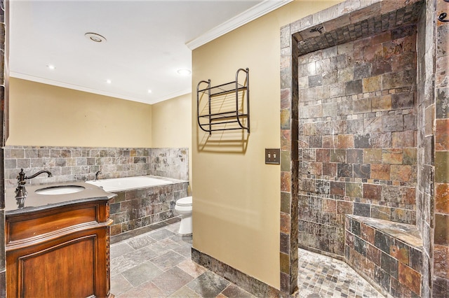 full bathroom featuring stone tile floors, toilet, ornamental molding, a garden tub, and a walk in shower