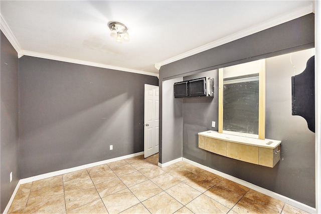 unfurnished bedroom featuring light tile patterned flooring, baseboards, an AC wall unit, a closet, and crown molding