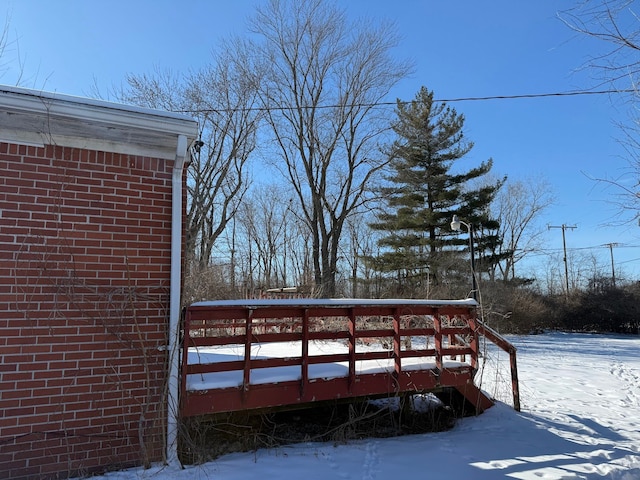 view of snow covered deck