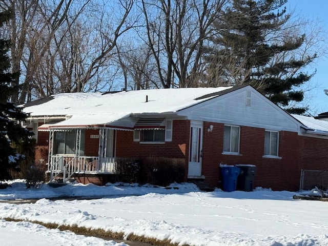 view of front of home with brick siding