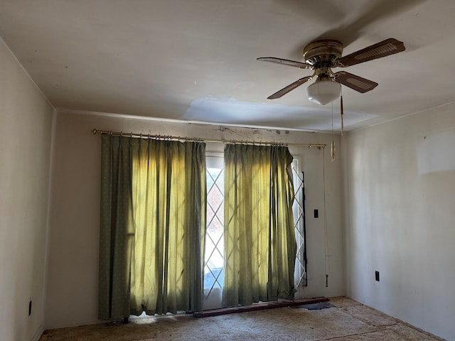 unfurnished room featuring a ceiling fan