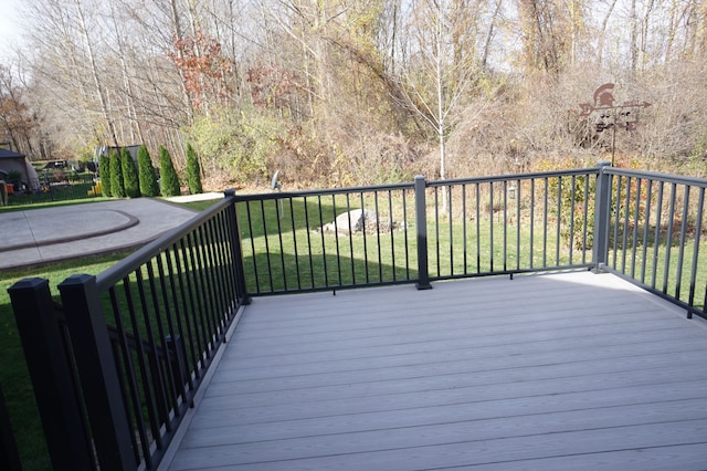 deck featuring a lawn