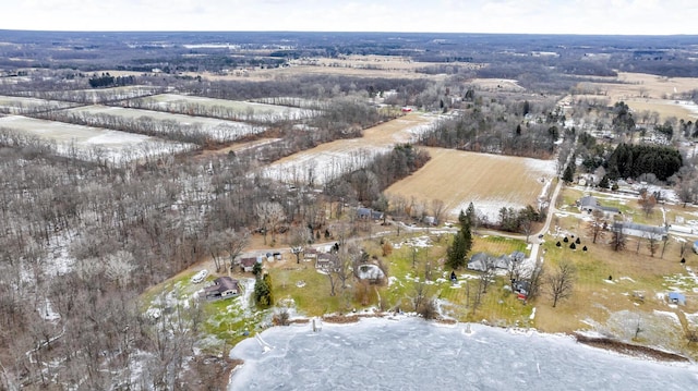 snowy aerial view with a rural view