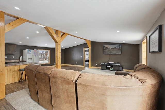 4087 Amble Rd, Coral, MI 49322 - living area with lofted ceiling, wood finished floors, and recessed lighting