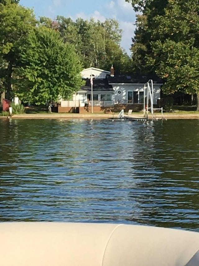 exterior space with a water view