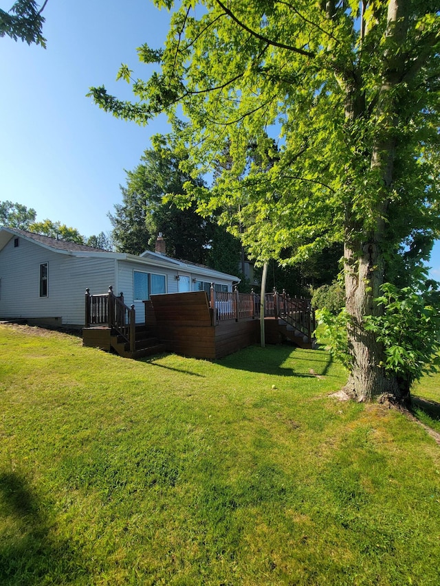 view of yard featuring a deck