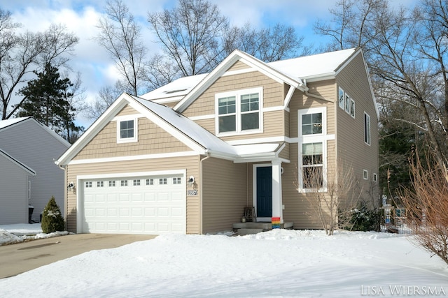 craftsman house featuring a garage