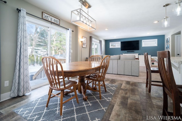 dining space with dark wood-style floors, recessed lighting, and baseboards