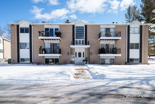 view of snow covered property