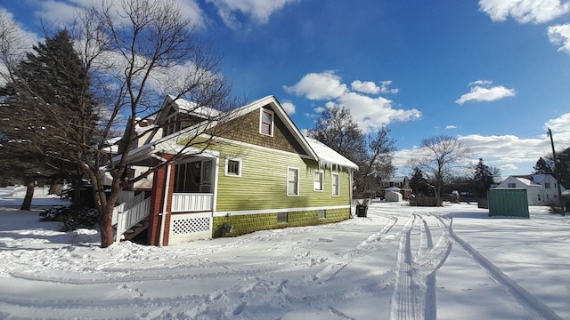 view of snow covered property