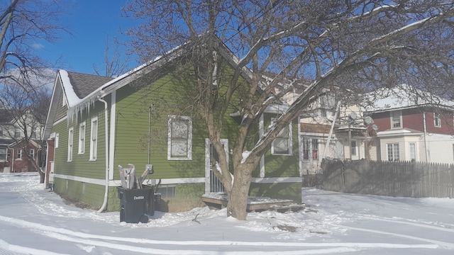 view of front of home with fence