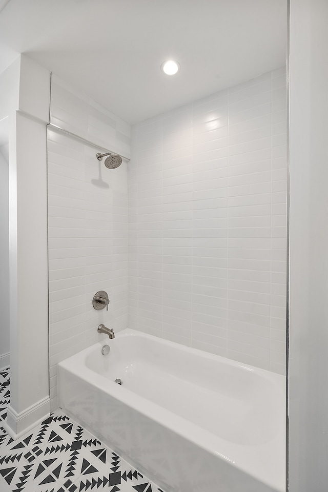 bathroom with tile patterned flooring, shower / tub combination, baseboards, and recessed lighting