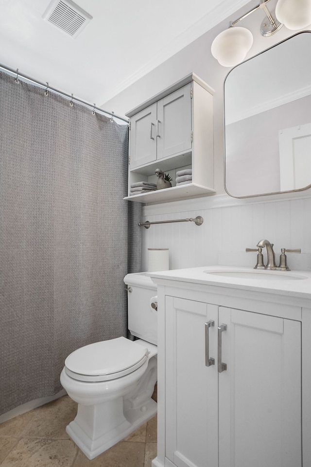 bathroom featuring curtained shower, tile patterned flooring, toilet, vanity, and visible vents