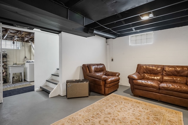 basement with washer / clothes dryer, stairway, and a sink