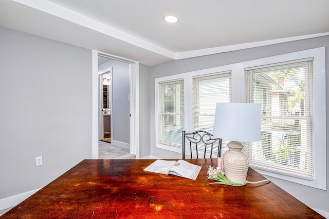 office space featuring baseboards, a wealth of natural light, and recessed lighting