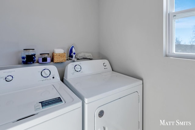 laundry area featuring laundry area and washing machine and clothes dryer