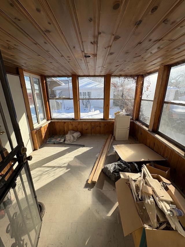 sunroom / solarium featuring wooden ceiling