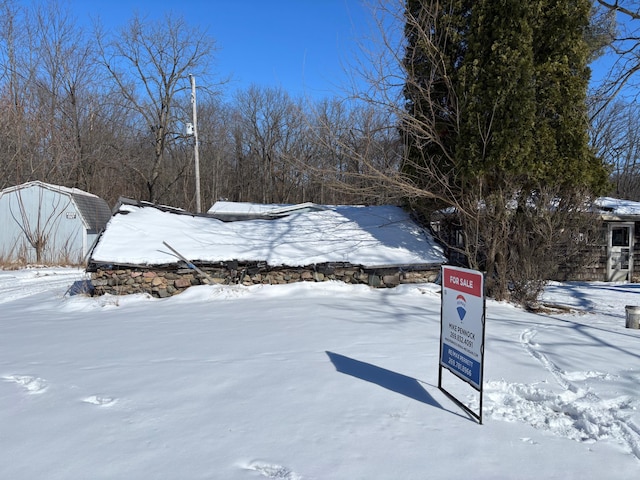 view of yard covered in snow