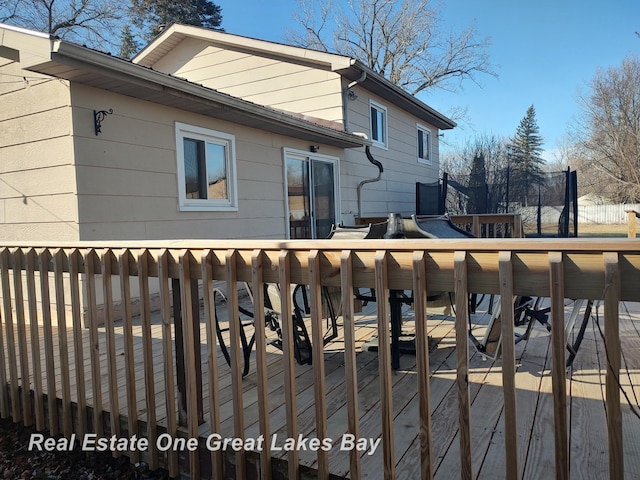 wooden deck featuring fence