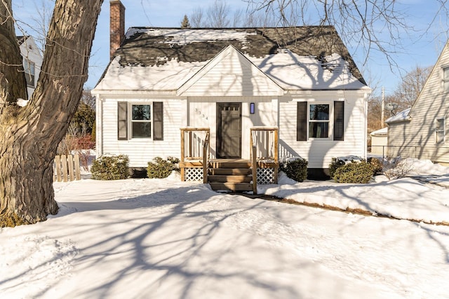 view of front of house with a chimney