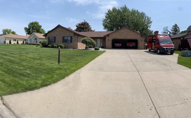 ranch-style house featuring a garage, brick siding, driveway, and a front lawn