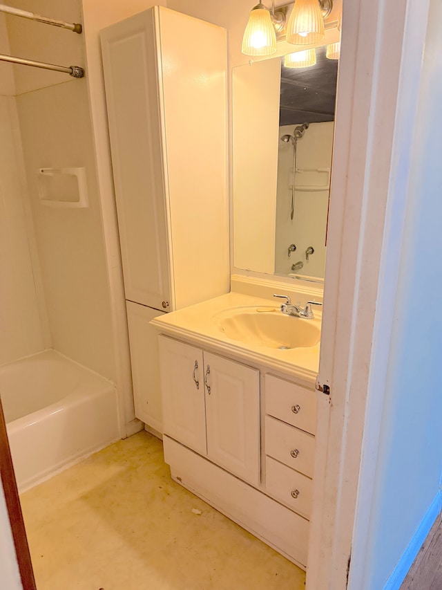 bathroom featuring shower / bathtub combination and vanity