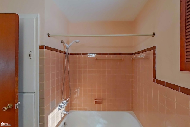 bathroom featuring bathing tub / shower combination