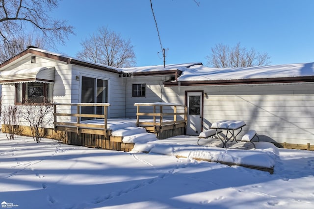 view of snow covered property