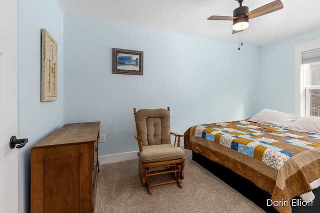 bedroom featuring ceiling fan, carpet flooring, and baseboards