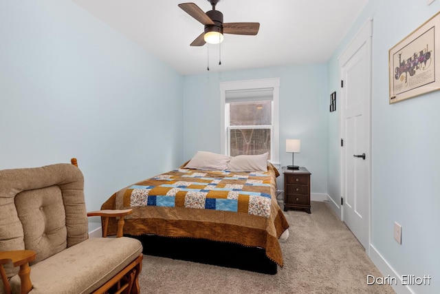 bedroom with baseboards, ceiling fan, and light colored carpet