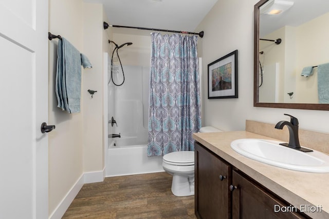 full bath with vanity, wood finished floors, toilet, and shower / bathtub combination with curtain