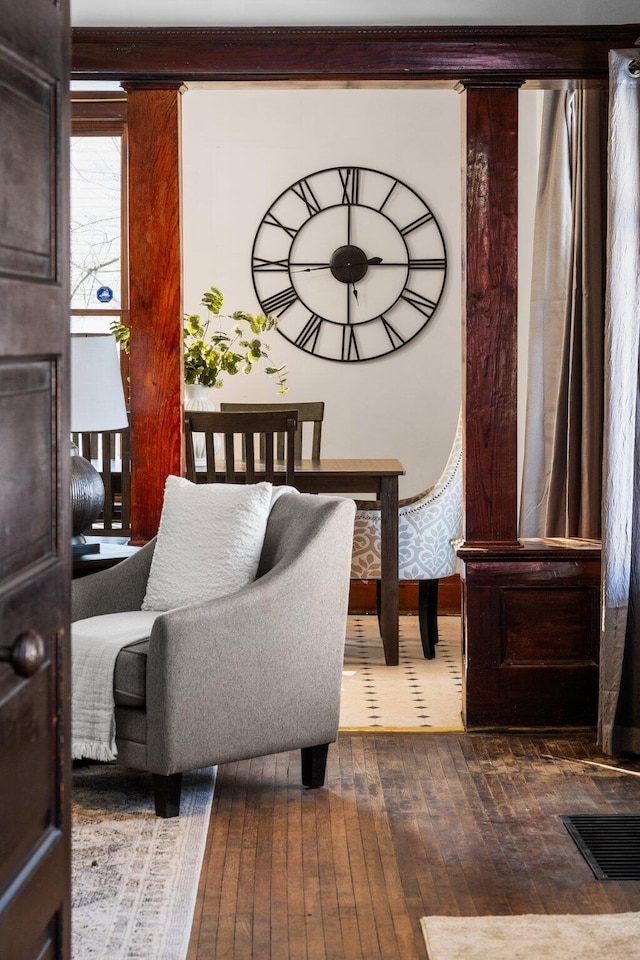 interior space featuring dark wood-style flooring and visible vents