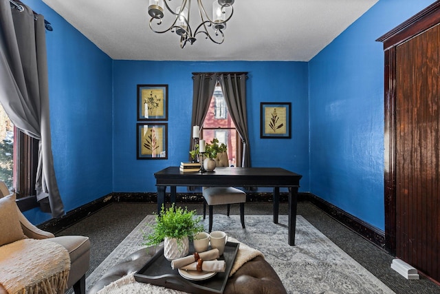 office with a notable chandelier and baseboards