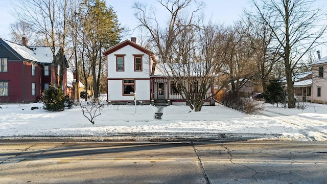 view of front of property with a chimney