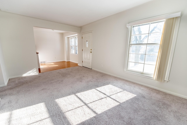 18953 Woodcrest St, Harper Woods, MI 48225 - empty room with light carpet, visible vents, and baseboards