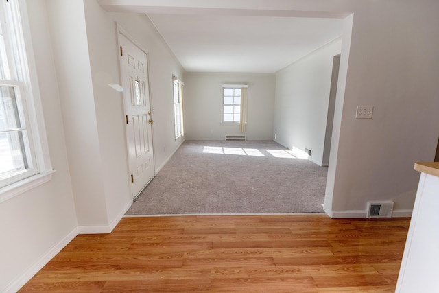 18953 Woodcrest St, Harper Woods, MI 48225 - foyer featuring light wood-style flooring, visible vents, and baseboards