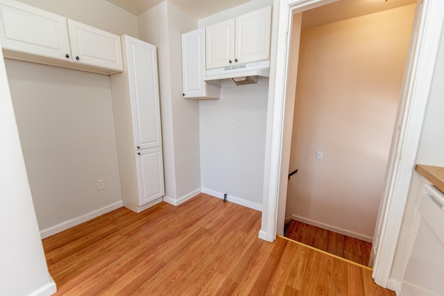 18953 Woodcrest St, Harper Woods, MI 48225 - washroom with light wood-style flooring and baseboards
