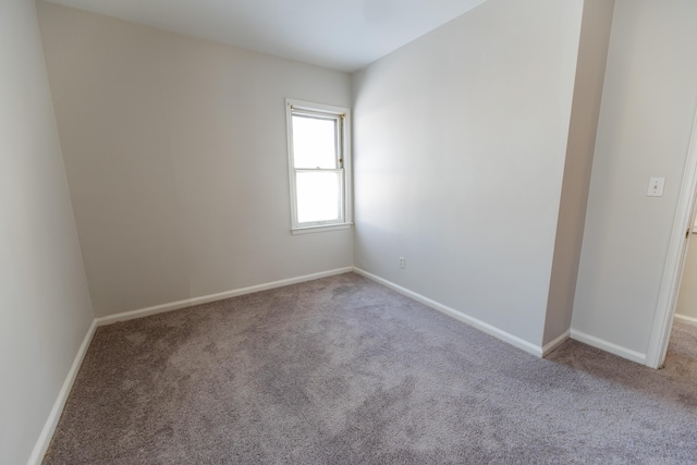 18953 Woodcrest St, Harper Woods, MI 48225 - carpeted spare room featuring baseboards